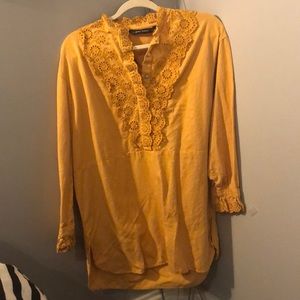 Mustard color dress with lace-like detail